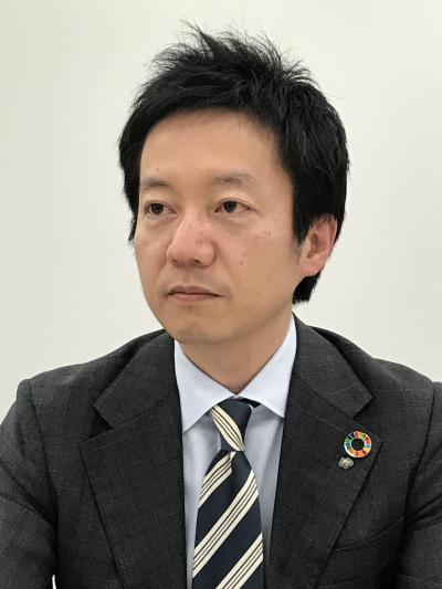 野村證券_写真（佐藤氏）.jpg